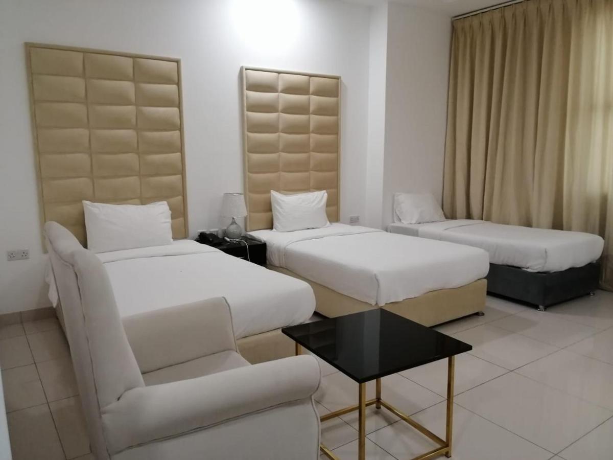 Parkside Plaza Muscat Hotel Bagian luar foto