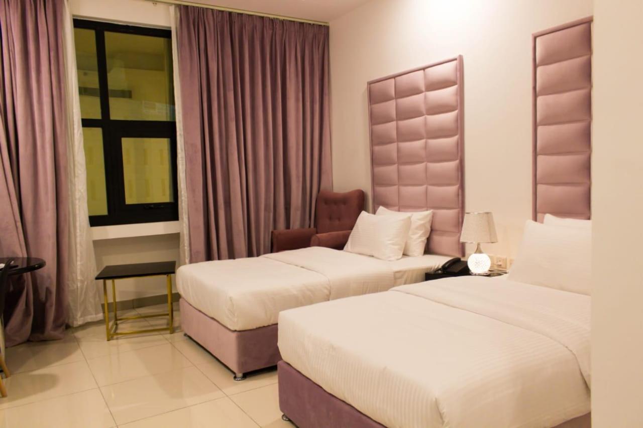 Parkside Plaza Muscat Hotel Bagian luar foto